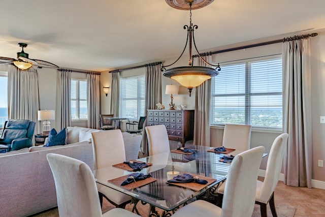 dining area with ceiling fan