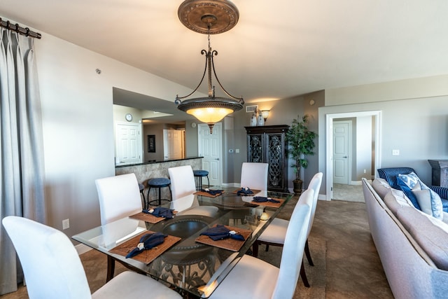 dining area featuring carpet flooring