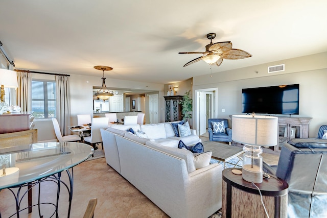 living room with ceiling fan