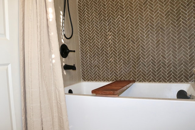 bathroom with a shower with shower curtain