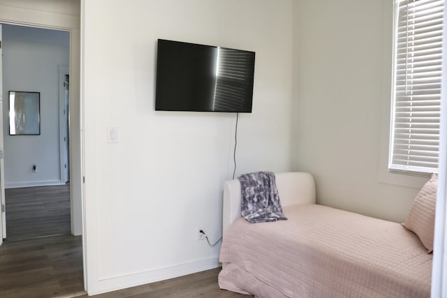 bedroom featuring dark hardwood / wood-style floors