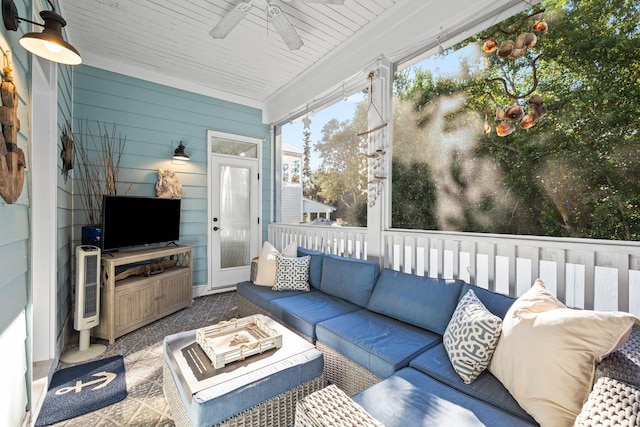 sunroom / solarium with ceiling fan