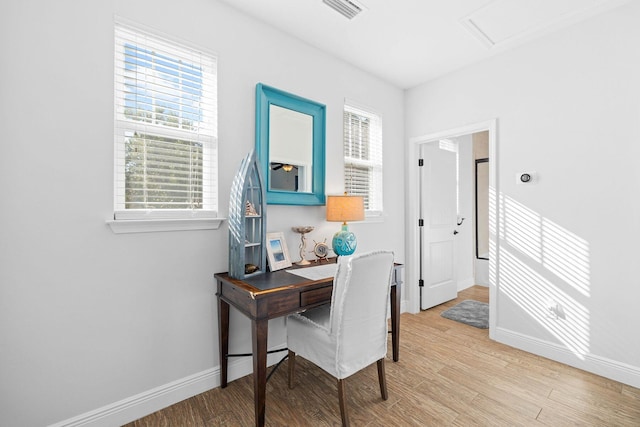 home office with light wood-type flooring