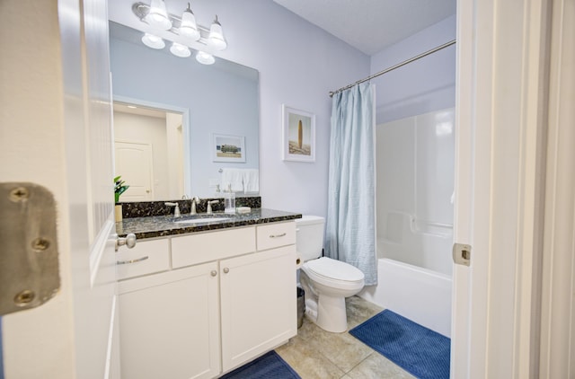 full bathroom featuring toilet, shower / bath combo, vanity, and tile patterned floors