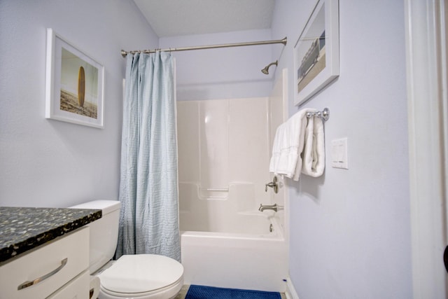 full bathroom featuring vanity, shower / bathtub combination with curtain, and toilet