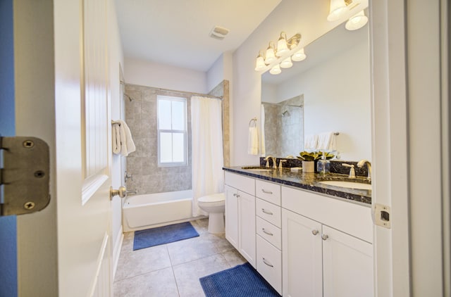 full bathroom with shower / bathtub combination with curtain, tile patterned flooring, vanity, and toilet