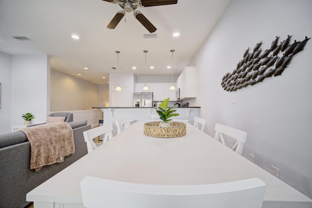 dining room with ceiling fan