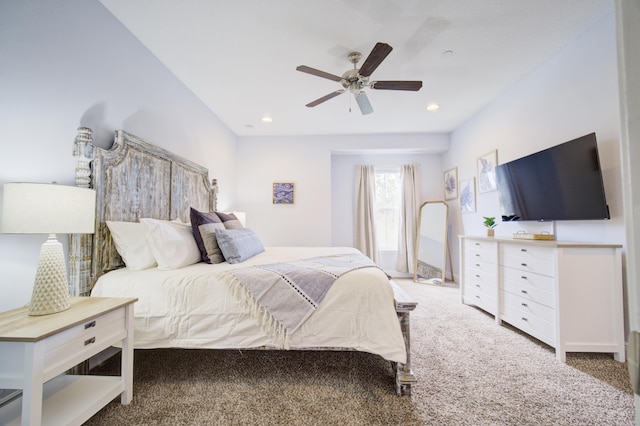 carpeted bedroom with ceiling fan