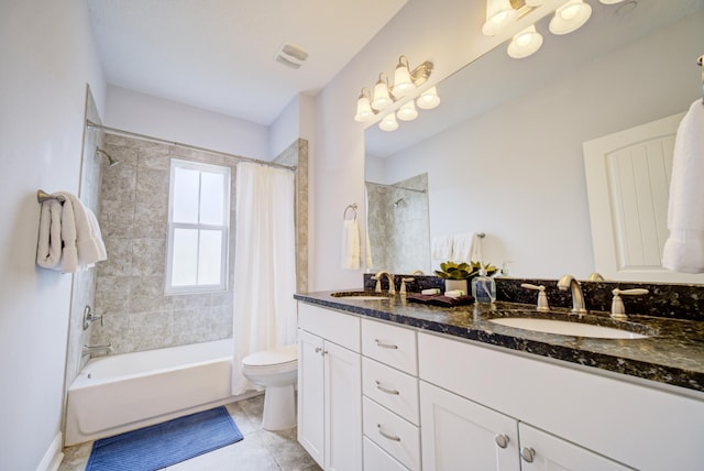 full bathroom featuring tile patterned floors, vanity, toilet, and shower / bathtub combination with curtain