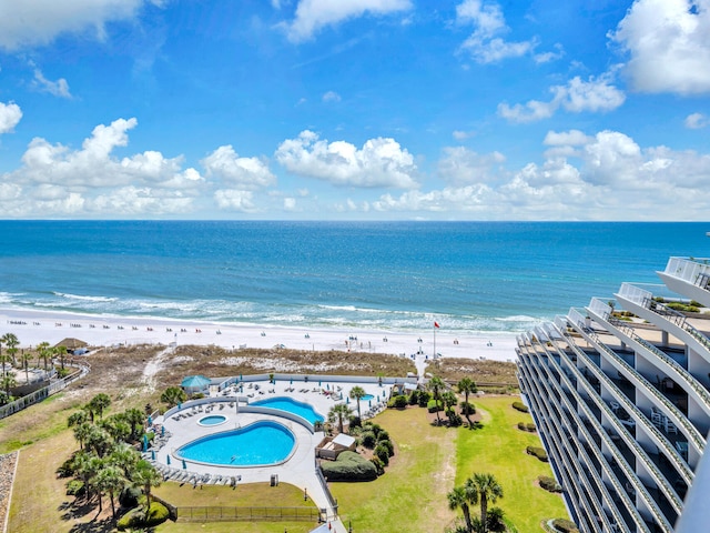 aerial view featuring a water view and a beach view