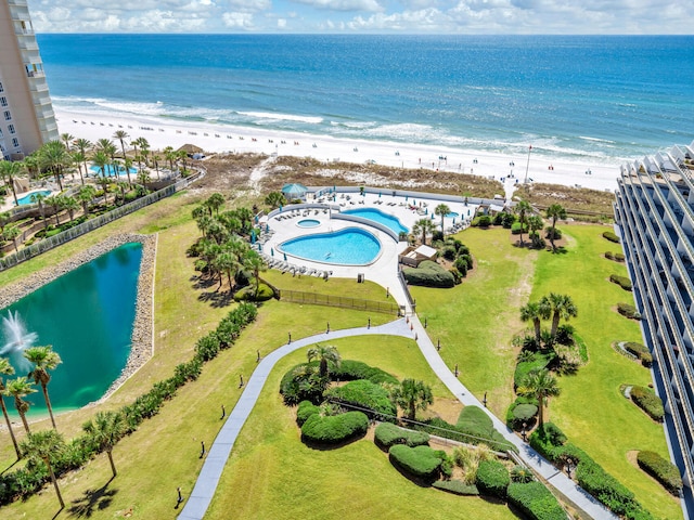 aerial view featuring a water view and a beach view