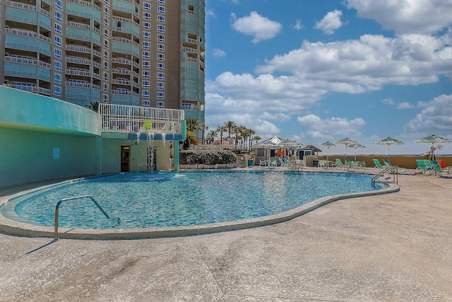 pool with a patio