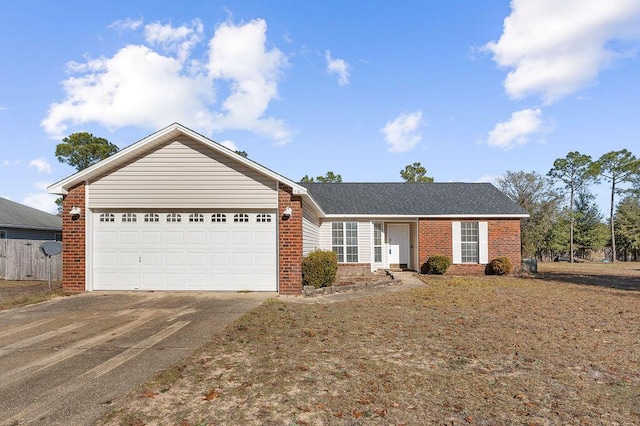 ranch-style home featuring a garage