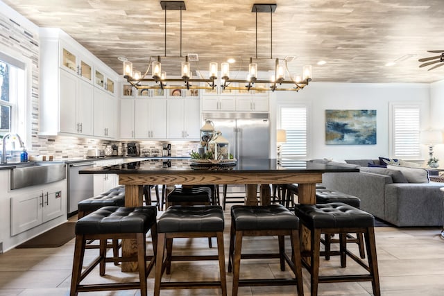 11 Wadleigh Way, Miramar Beach, FL 32550 - kitchen with plenty of natural light, stainless steel appliances, and decorative backsplash