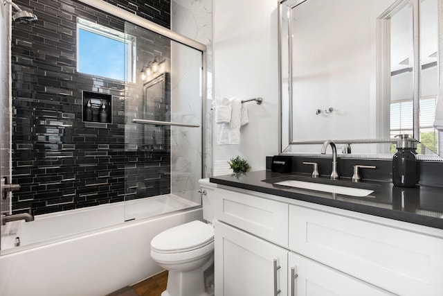 11 Wadleigh Way, Miramar Beach, FL 32550 - full bath with combined bath / shower with glass door, vanity, and toilet