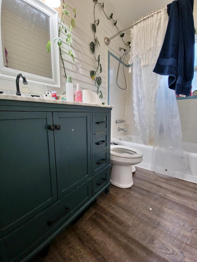 full bathroom featuring toilet, vanity, shower / bath combination with curtain, and hardwood / wood-style floors