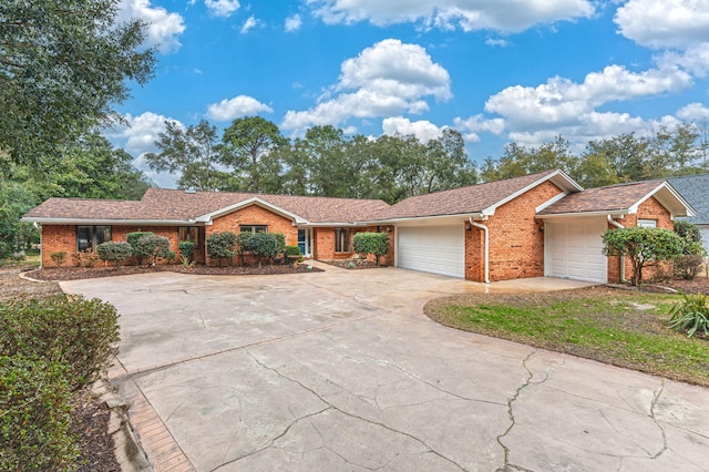 single story home with a garage