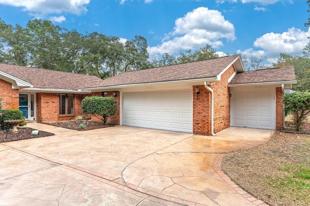 single story home with a garage