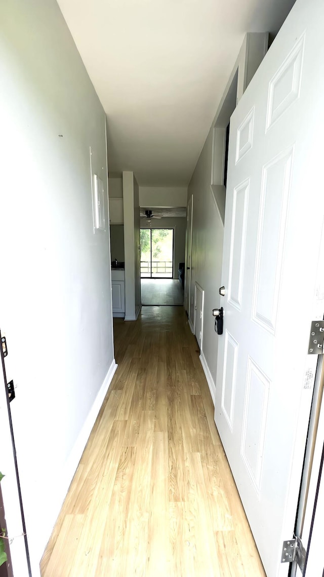 hallway featuring light hardwood / wood-style flooring