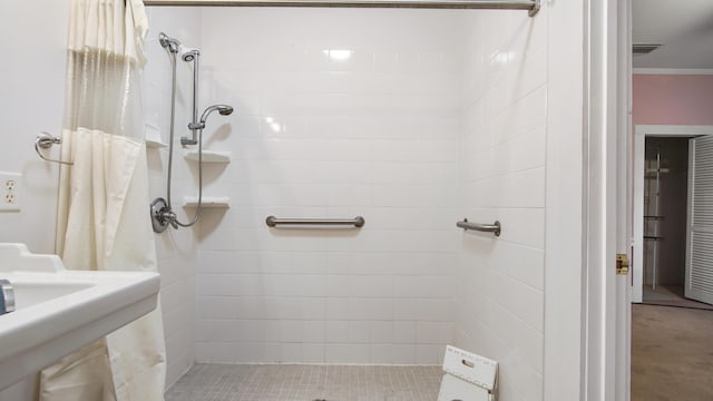 132 Circle Dr, Defuniak Springs, FL 32435 - bathroom featuring crown molding and walk in shower