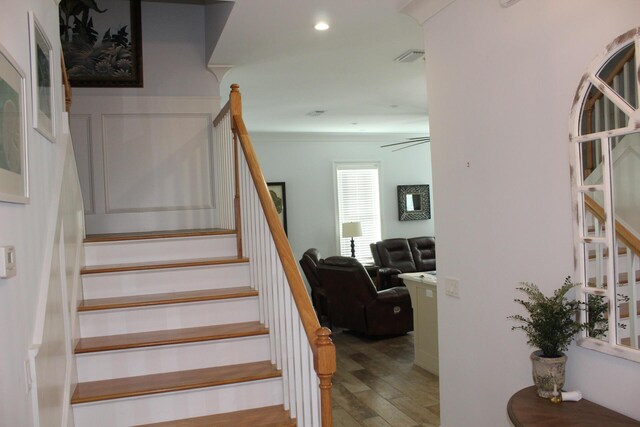 staircase featuring hardwood / wood-style flooring