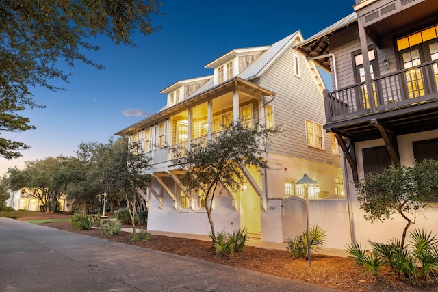 view of property exterior at dusk