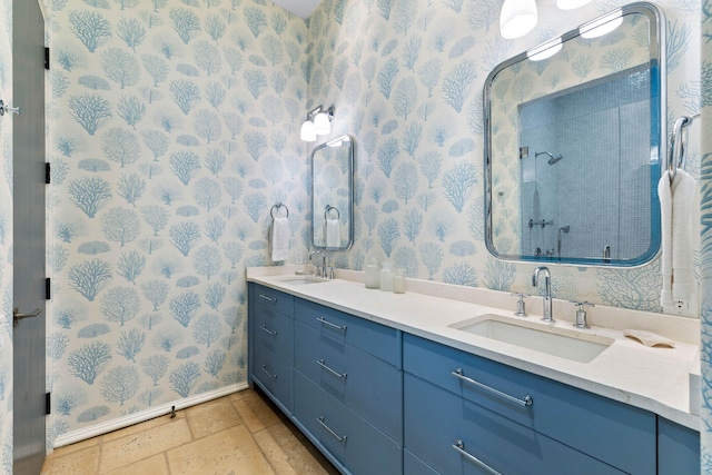 bathroom with a shower and vanity