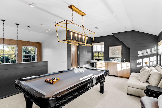 recreation room with light carpet, wood walls, lofted ceiling, and pool table