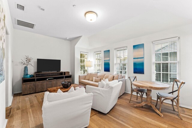 living room with light hardwood / wood-style floors