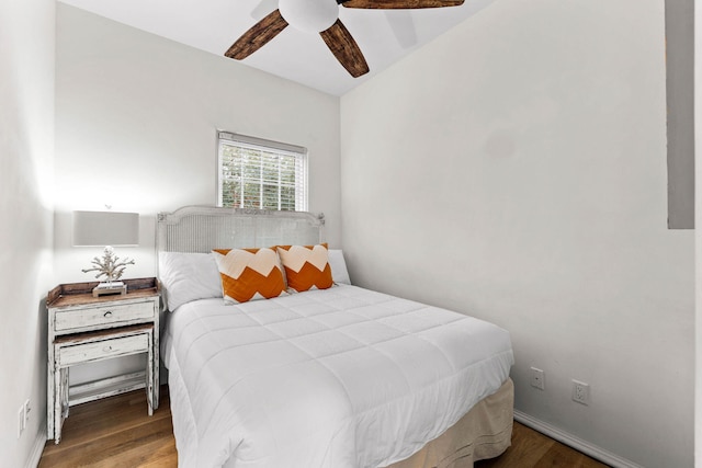 bedroom with wood-type flooring and ceiling fan