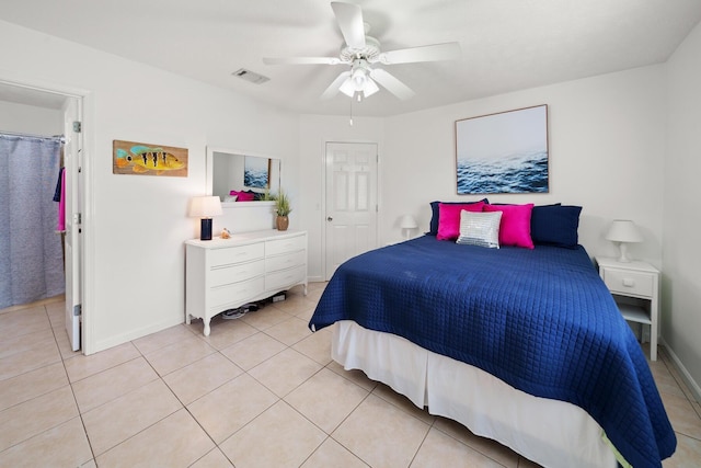 bedroom featuring ceiling fan and light tile patterned flooring