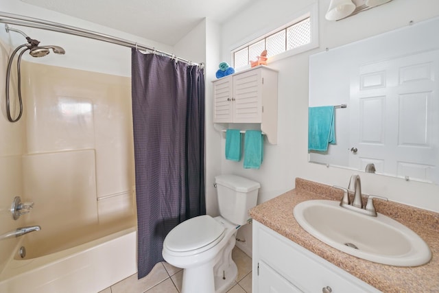 full bathroom with tile patterned floors, vanity, shower / tub combo, and toilet