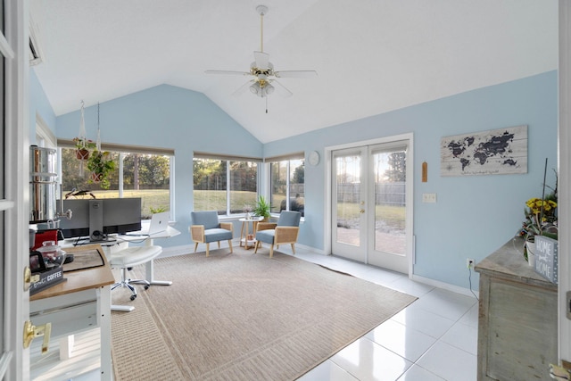 sunroom / solarium featuring lofted ceiling, french doors, ceiling fan, and plenty of natural light