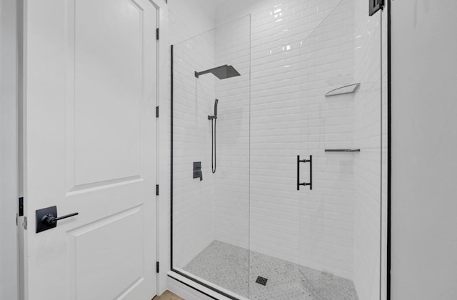 bathroom featuring an enclosed shower