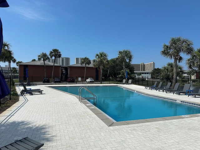 view of swimming pool featuring a patio area