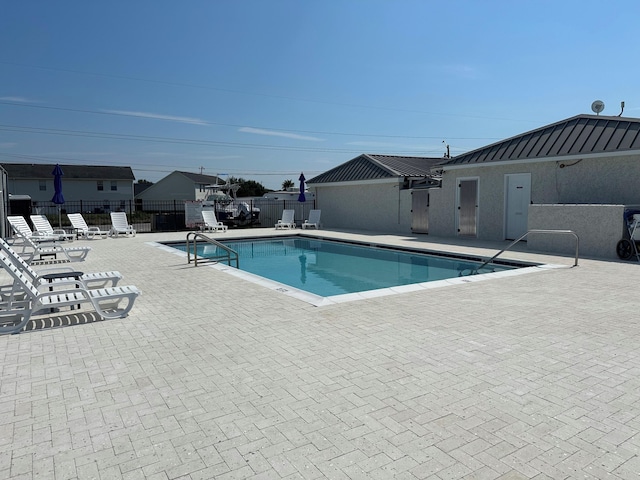 view of pool with a patio area