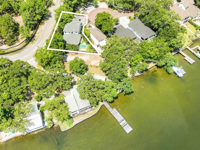 bird's eye view featuring a water view and a residential view