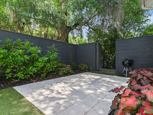 view of patio / terrace with fence