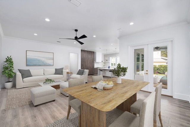 156 Beacon Point Dr, Santa Rosa Beach, FL 32459 - dining room with a ceiling fan, ornamental molding, light wood-style flooring, recessed lighting, and baseboards