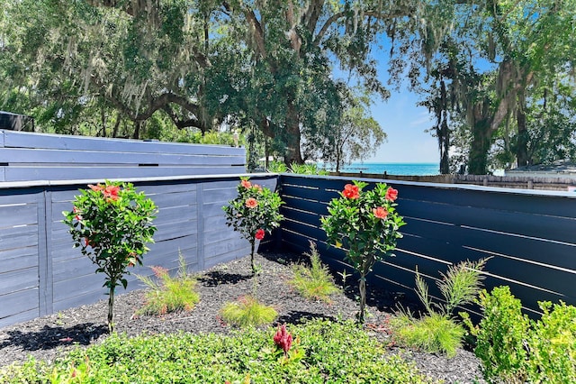 156 Beacon Point Dr, Santa Rosa Beach, FL 32459 - view of yard with fence and a water view