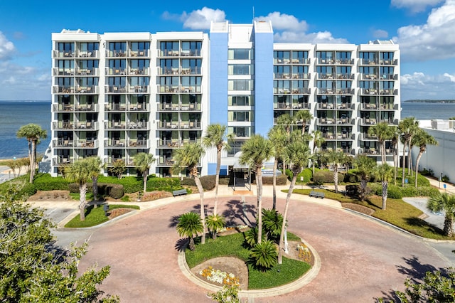 view of building exterior featuring a water view