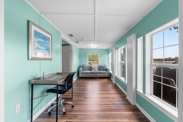 home office featuring wood-type flooring and a wealth of natural light