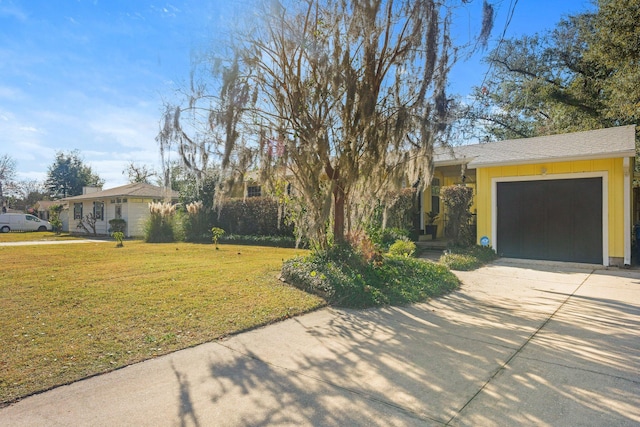 view of yard featuring a garage