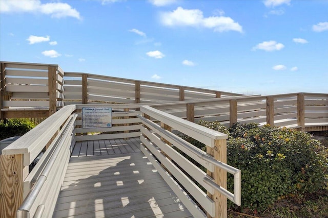 view of home's community featuring a wooden deck