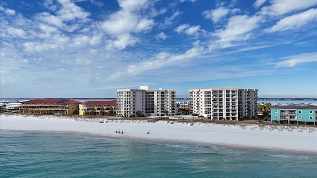 drone / aerial view with a view of the beach and a water view