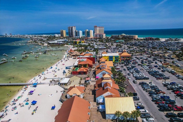 bird's eye view with a beach view and a water view