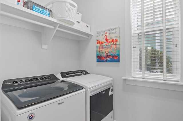 washroom with laundry area and washing machine and dryer