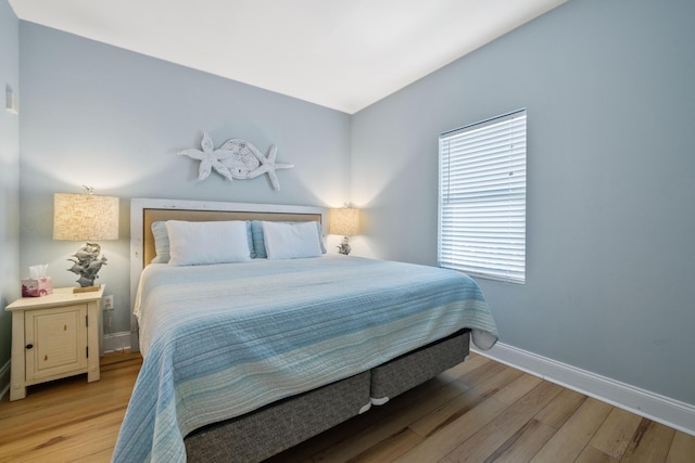 bedroom featuring light hardwood / wood-style floors