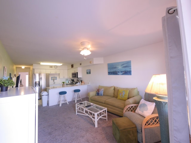 living room featuring carpet floors