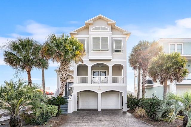 coastal inspired home featuring a garage